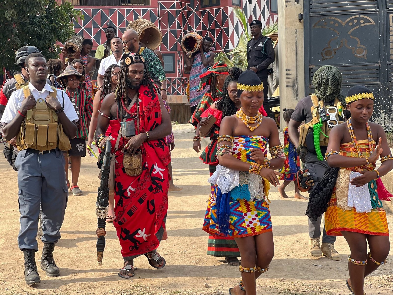 a group of people in colorful African clothing